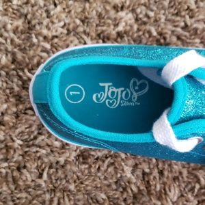 Teal glitter converse